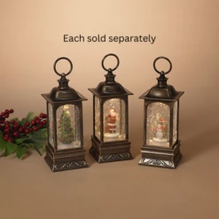 9.25" Battery Operated Lighted Musical Spinning Water Globe Lantern With Rotating Holiday Figurine